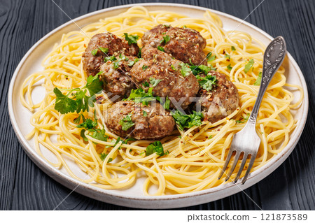 pork burger steak with spaghetti on a plate 121873589