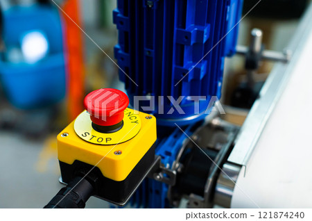 Simple red emergency stop button, machine rotation safety switch. Workplace safety, health hazard, worker protection abstract symbol 121874240