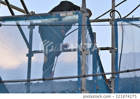 High pressure roof cleaning, residential painting work, roof tiles 121874275