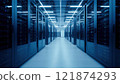 High-tech data center with rows of servers illuminated by blue lights 121874293