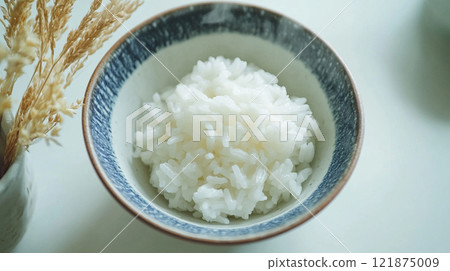 Rice served in a bowl 121875009