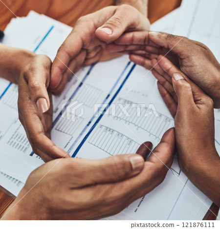 Hands form a circle together for teamwork, community and collaboration of business team. Above view of workers showing a trust and unity hand gesture. Office support of group of colleagues 121876111