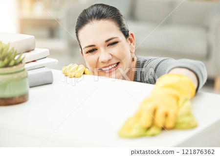 Spring cleaning, chores and sanitize for a clean, hygiene and fresh home while doing housework. Happy woman, cleaner and housekeeper wiping to disinfect a surface during routine household task Spring cleaning, chores and sanitize for a clean, hygiene and fresh home while doing housework. Happy woman, cleaner and housekeeper wiping to disinfect a surface during routine household task 121876362