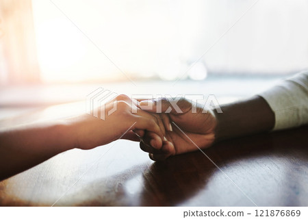 Help, love and support of a couple holding hands in comfort at home. Romantic people in a caring, loving and affectionate relationship, unity and care for relief in closeup, on copy space background. Help, love and support of a couple holding hands in comfort at home. Romantic people in a caring, loving and affectionate relationship, unity and care for relief in closeup, on copy space background. 121876869