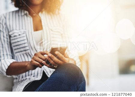 Hands texting on phone, browsing social media or searching internet while waiting for job interview or new opportunity in creative office. Closeup of business woman working on startup website on tech Hands texting on phone, browsing social media or searching internet while waiting for job interview or new opportunity in creative office. Closeup of business woman working on startup website on tech 121877040