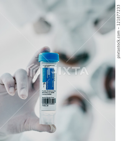 Covid, scientists and vaccine vial while a group medical practitioners, chemists and researchers stand together from below. Innovation cure, treatment and medicine for virus and clinical trial Covid, scientists and vaccine vial while a group medical practitioners, chemists and researchers stand together from below. Innovation cure, treatment and medicine for virus and clinical trial 121877233