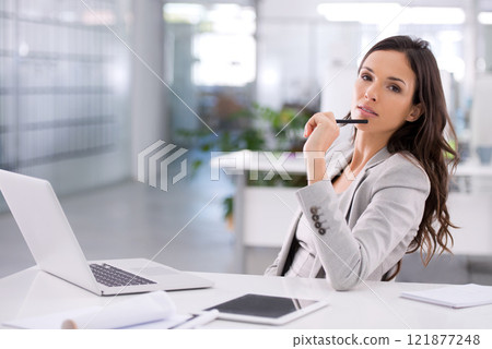 Confident businesswoman thinking about a corporate strategy to boost sales at her desk while holding a pen with her laptop open in an office. Successful professional female planning a campaign alone Confident businesswoman thinking about a corporate strategy to boost sales at her desk while holding a pen with her laptop open in an office. Successful professional female planning a campaign alone 121877248