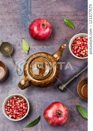 Fresh pomegranate juice or tea. Fresh pomegranate juice or tea. 121877679