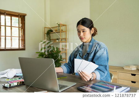 Young female architect envisions project with technology. Young female architect envisions project with technology. 121878737