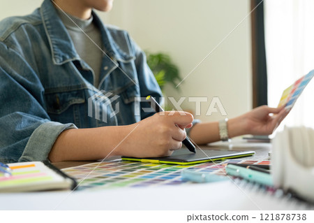 Young female architect envisions project with technology. Young female architect envisions project with technology. 121878738