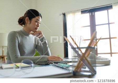 Young female architect envisions project with technology. 121878896