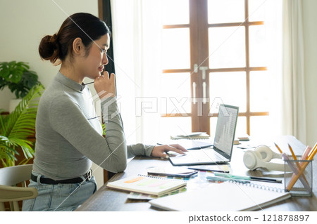 Young female architect envisions project with technology. Young female architect envisions project with technology. 121878897
