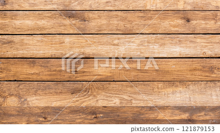 Brown wooden plank background. Brown wooden plank background. 121879153
