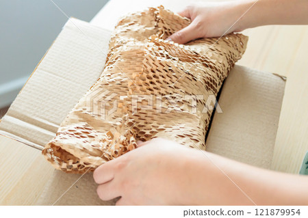 Eco friendly brown paper honeycomb wrap for product packaging parcel carton box 121879954