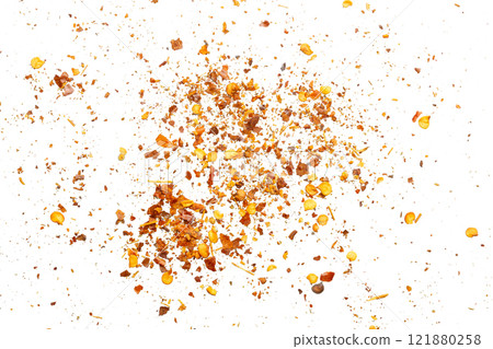 dried red chili pepper flakes and seeds isolated on white background dried red chili pepper flakes and seeds isolated on white background 121880258