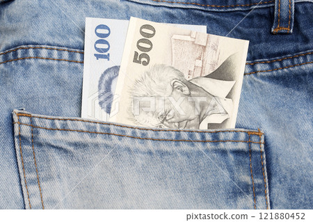 Israeli pound in the pocket of blue jeans 121880452
