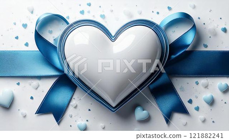Heart-shaped gift wrapped in a blue ribbon 121882241