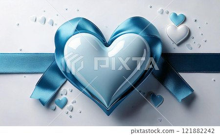 Heart-shaped gift wrapped in a blue ribbon Heart-shaped gift wrapped in a blue ribbon 121882242
