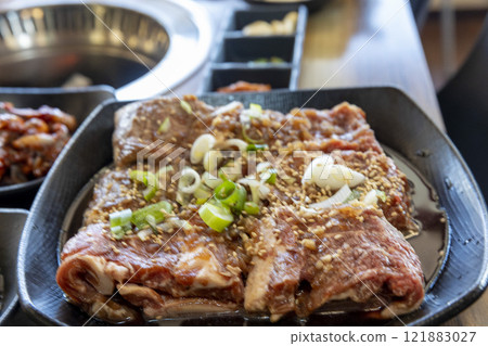 Korean BBQ. Seasoned beef ribs 121883027