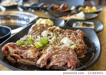 Korean BBQ. Seasoned beef ribs 121883031