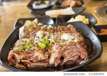 Korean BBQ. Seasoned beef ribs 121883043