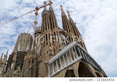 BARCELONA, SPAIN - AUG 30th, 2017: View of main facade of Sagrada Familia Holy Family church designed by Spanish architect Antoni Gaudi 121883458