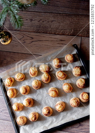 Pogaca stuffed with cheese. A full tray of fresh Pogaca, salty buns with cheese - Pogace. Pogaca stuffed with cheese. A full tray of fresh Pogaca, salty buns with cheese - Pogace. 121883792