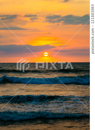Bright red sunset over the tropical sea. Bright red sunset over the tropical sea. 121883863