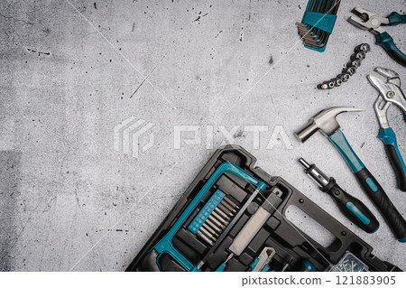 Set of tools on concrete background, Set of tools on concrete background, 121883905