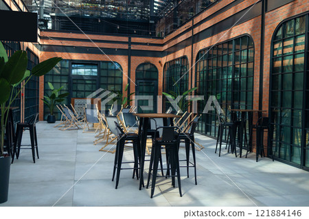 modern minimalist cafe, industrial style with brick wall, wood and black steel modern minimalist cafe, industrial style with brick wall, wood and black steel 121884146