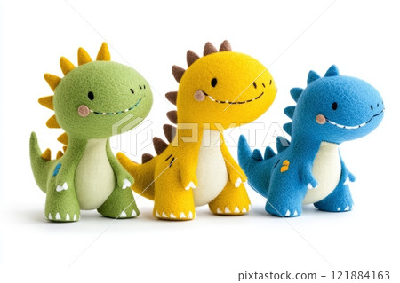 Three handmade plush dinosaurs smiling together on white background 121884163