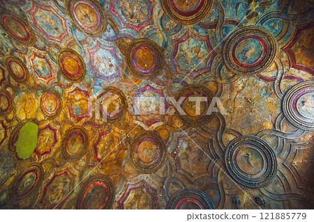 Explore the vibrant ceiling art with intricate circular patterns and captivating textures. Ancient ruins of Pompei city, Naples, Italy. 121885779