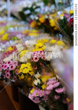 Flowers offered at the Buddhist altar Flowers offered at the Buddhist altar 121886142