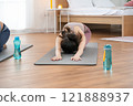 Asian women are exercising with yoga poses, health and wellness concept, exercise 121888937