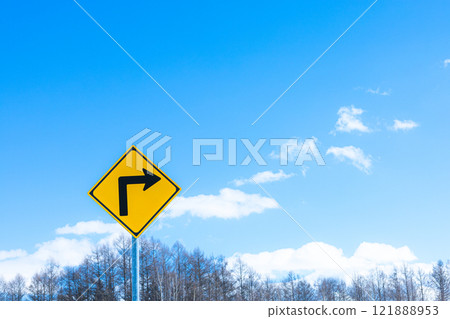 Blue sky and right turn sign with copy space Blue sky and right turn sign with copy space 121888953