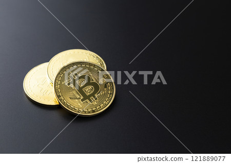 Bitcoin on a black background Bitcoin on a black background 121889077