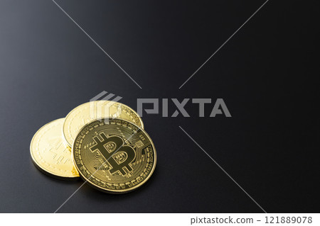 Bitcoin on a black background 121889078
