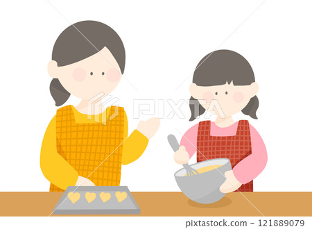 Parents and children making Valentine's Day heart-shaped sweets 121889079