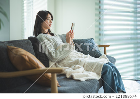 indoor portrait of a woman 121889574