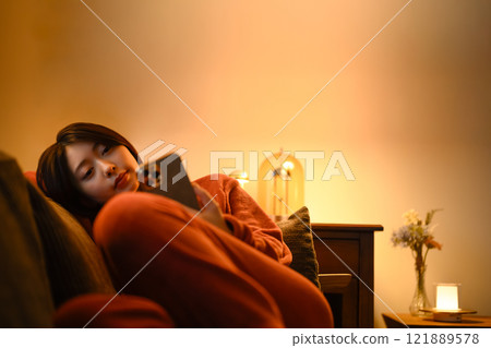 indoor portrait of a woman 121889578