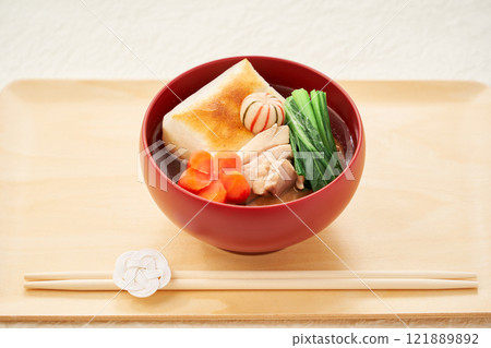 Traditional Kanto-style Ozouni – A delicious-looking ozoni made with square mochi and clear soup, with plenty of ingredients Traditional Kanto-style Ozouni – A delicious-looking ozoni made with square mochi and clear soup, with plenty of ingredients 121889892