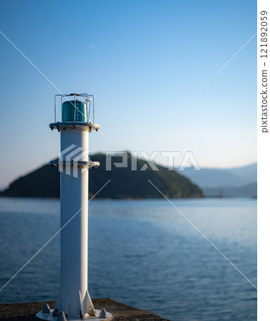 Blue sea and beacon lights 121892059