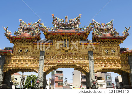 Low-angle view of the Donglong Temple Archway in Donggang Township, Pingtung County, Taiwan, is worshiped by Lord Wen. 121894340