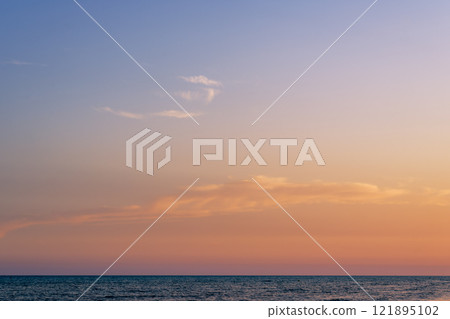 Calm sea and soft sunset Calm sea and soft sunset 121895102