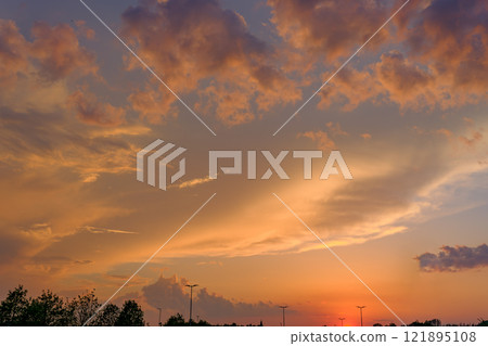 Magnificent sky and clouds dyed in the sunset 121895108