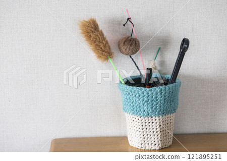 Knitted pot cover 121895251