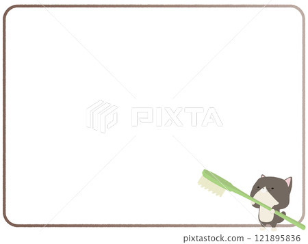 Frame of a brown-and-white cat holding a toothbrush 121895836