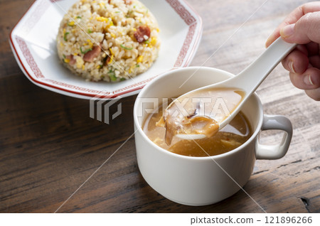 Fried rice and hot and sour soup 121896266