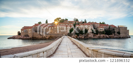 Sveti Stefan island near Budva at sunset light in winter time. Closed resort in Montenegro Sveti Stefan island near Budva at sunset light in winter time. Closed resort in Montenegro 121896332