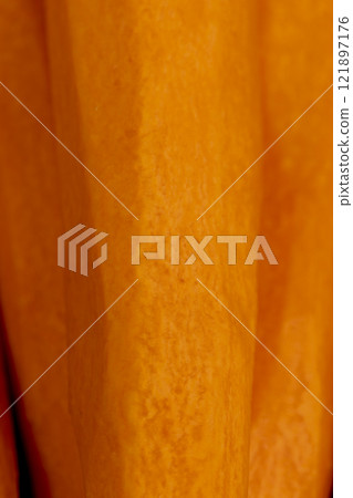 peeled orange carrots on the table during cooking 121897176